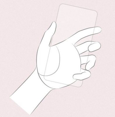 hand holding a phone reference